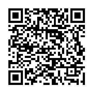 但是没看到笔记本电脑……他记得在火车上的时候二维码生成