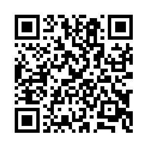 小张是和杨眉一起出外执行任务的另一名刑警二维码生成